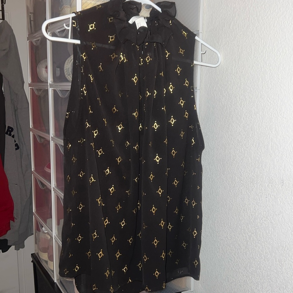 H&M women’s black and gold blouse, size Large.